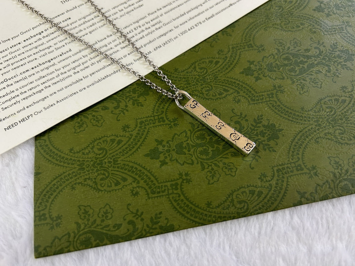 Martin Graham pendant necklace in polished metal-tone – main product view