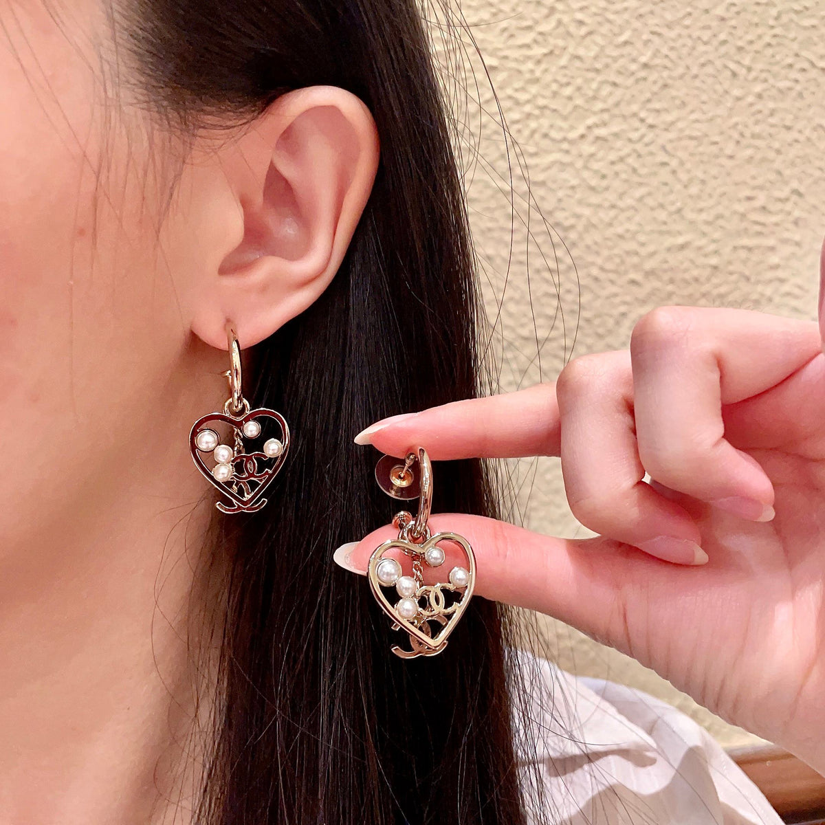 Martin Graham stud earrings in polished metal-tone – main product view