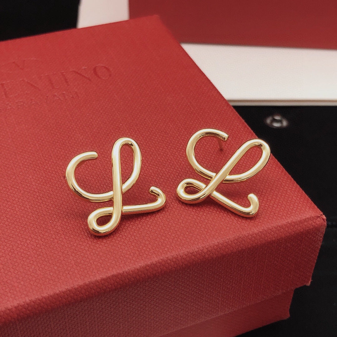 Martin Graham stud earrings in polished metal-tone – main product view