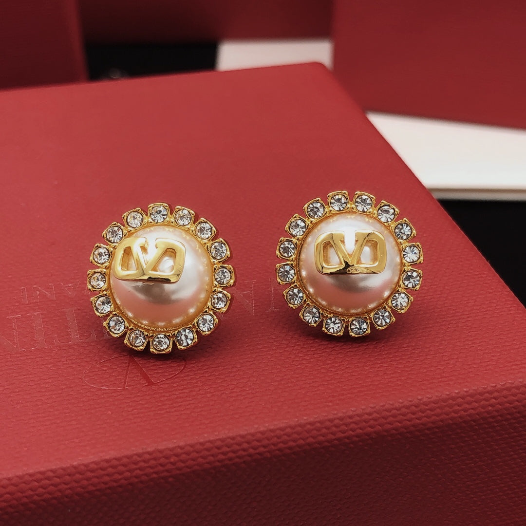 Martin Graham stud earrings in polished metal-tone – main product view