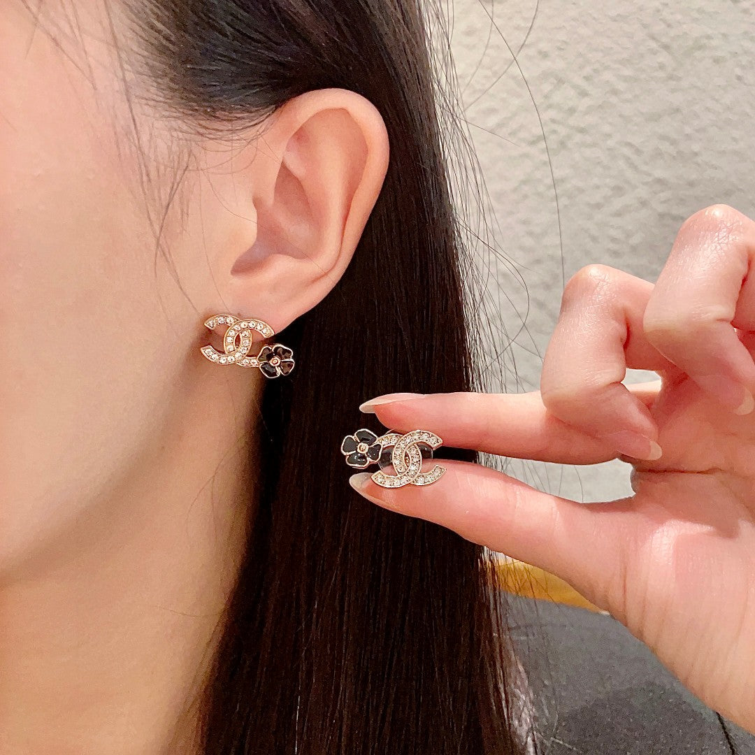 Martin Graham stud earrings in polished metal-tone – main product view