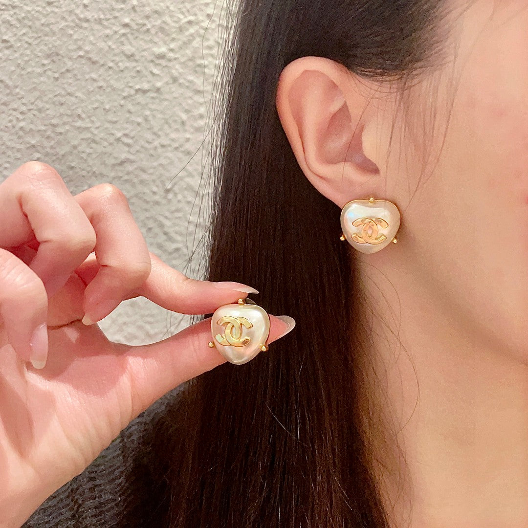 Martin Graham stud earrings in polished metal-tone – main product view