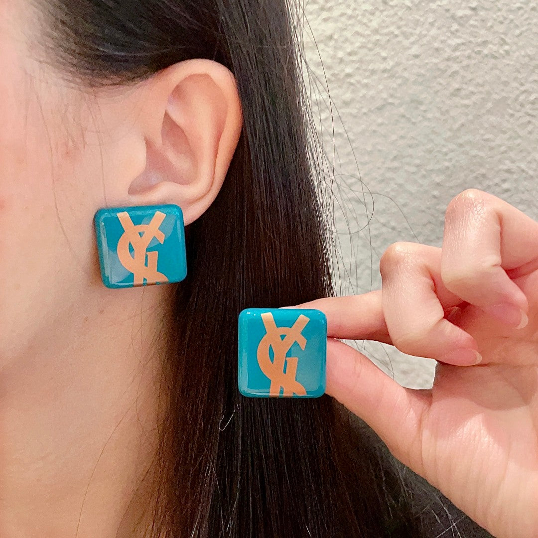 Martin Graham stud earrings in polished metal-tone – main product view