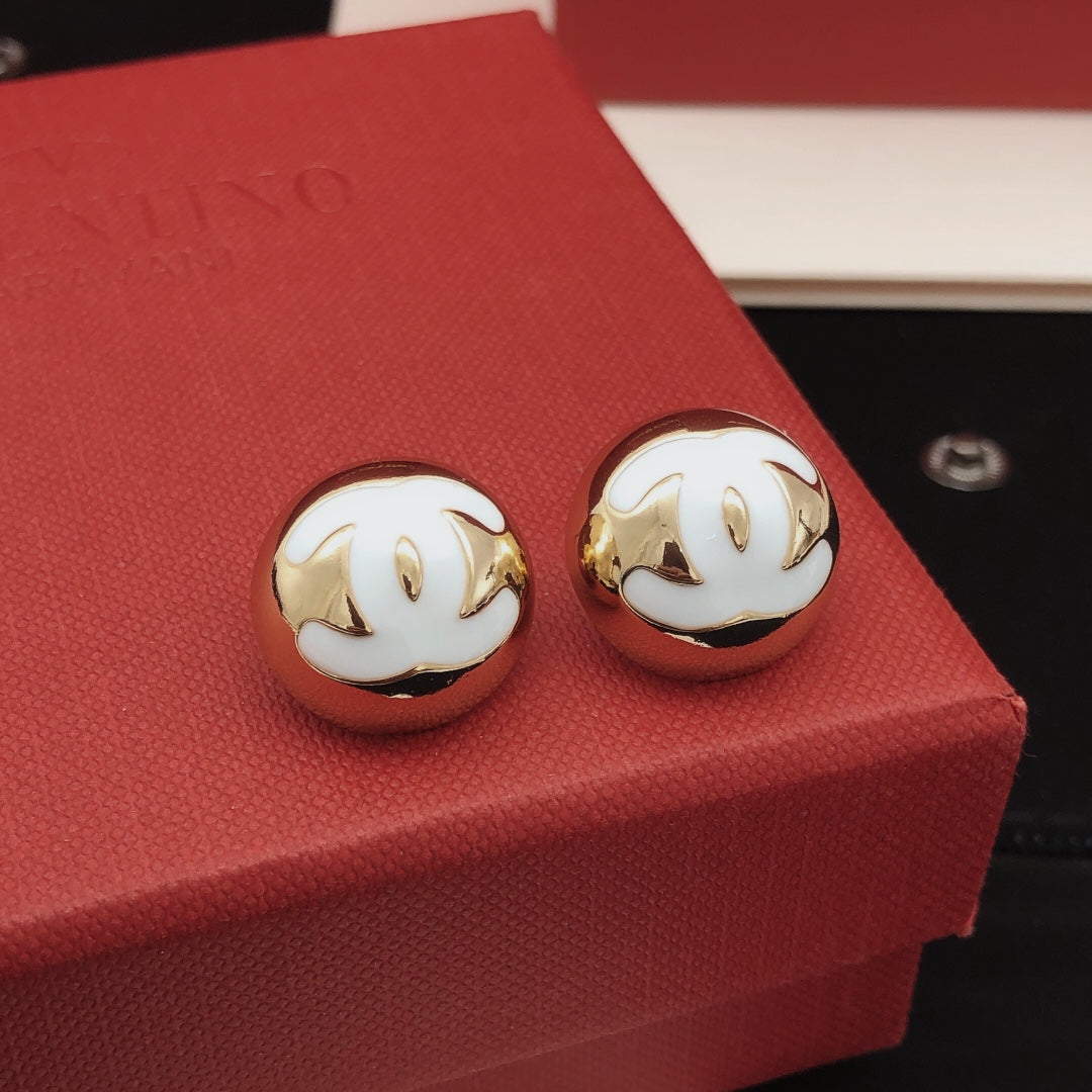 Martin Graham stud earrings in polished metal-tone – main product view