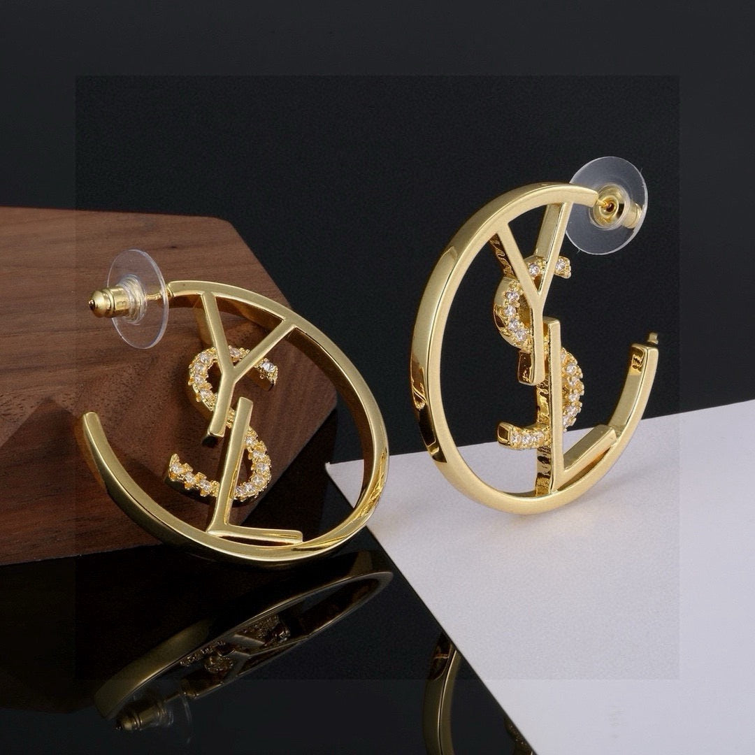 Martin Graham stud earrings in polished metal-tone – main product view