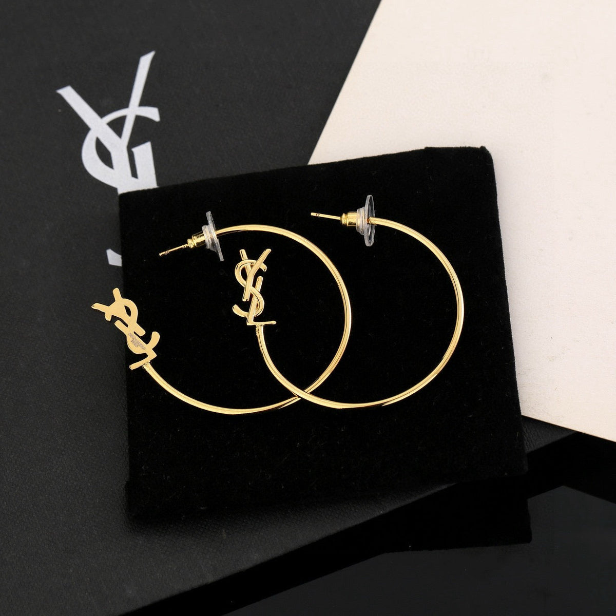 Martin Graham stud earrings in polished metal-tone – main product view