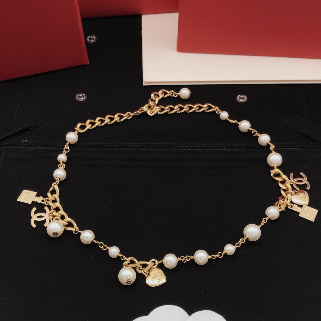 Martin Graham pendant necklace in polished metal-tone – main product view