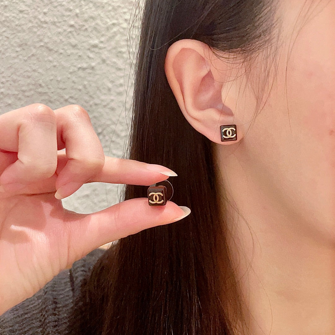 Martin Graham stud earrings in polished metal-tone – main product view