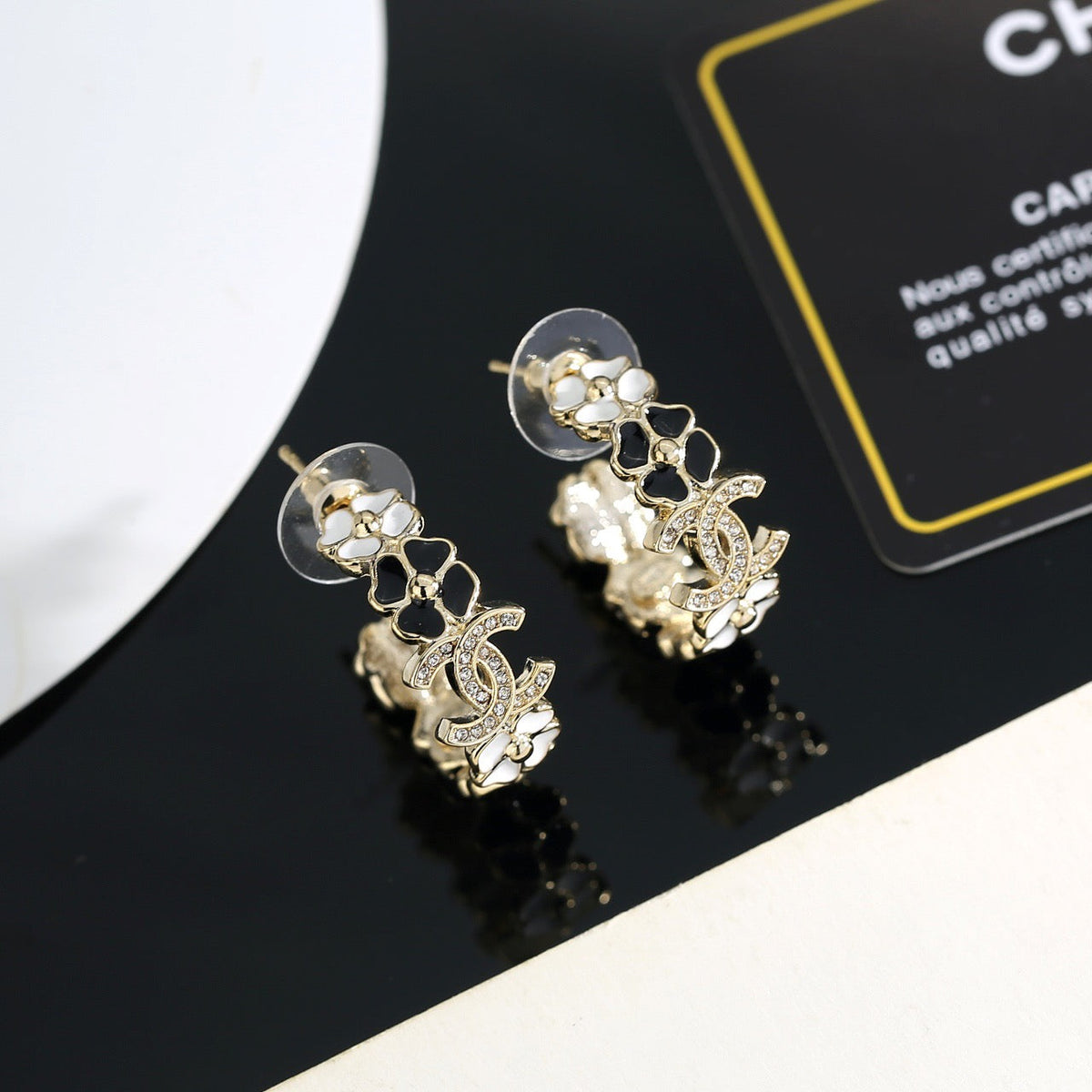 Martin Graham stud earrings in polished metal-tone – main product view
