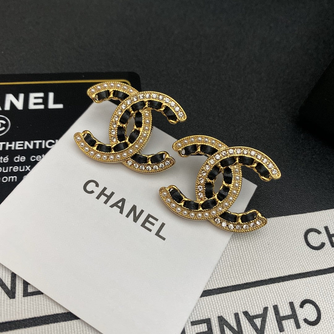 Martin Graham stud earrings in polished metal-tone – main product view
