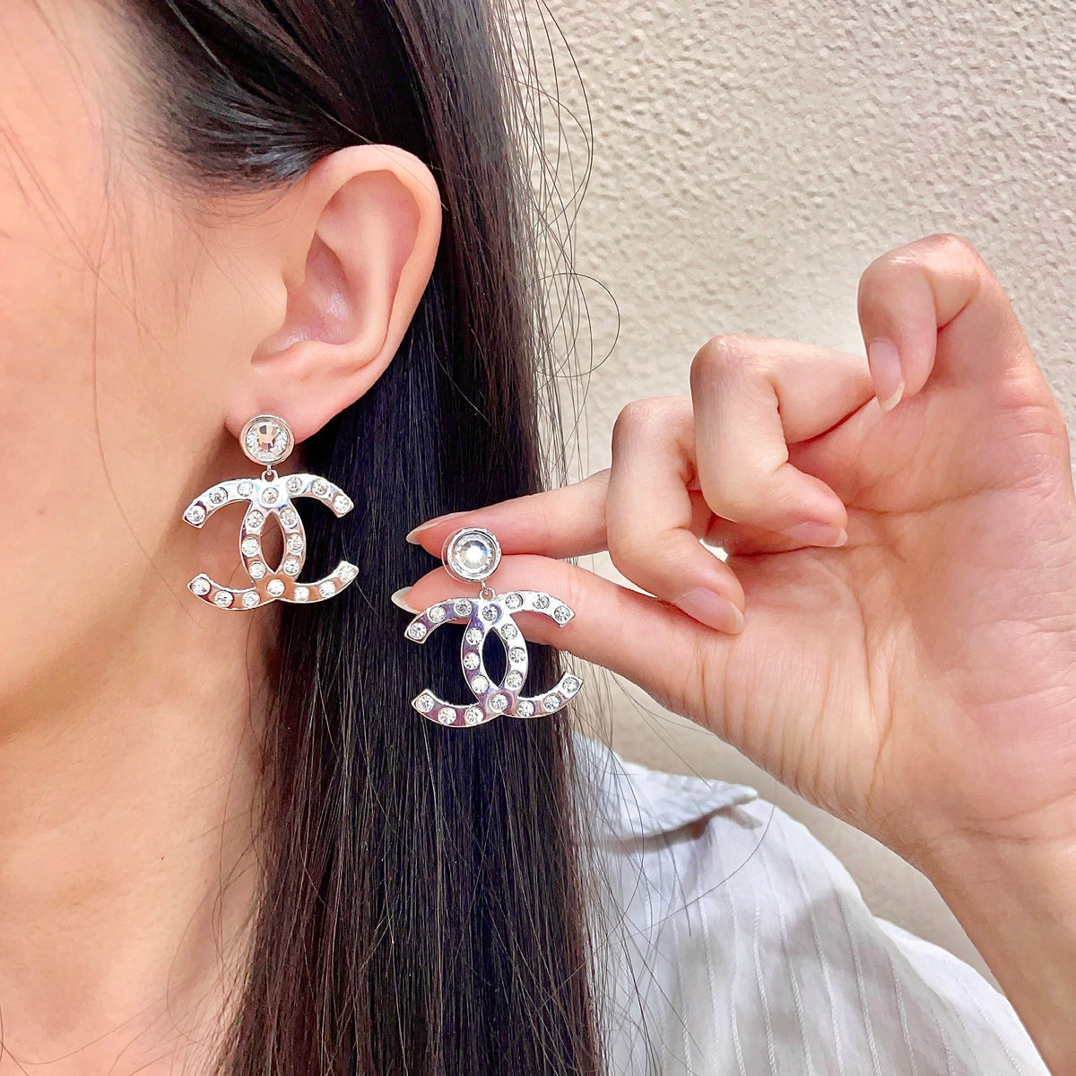 Martin Graham stud earrings in polished metal-tone – main product view