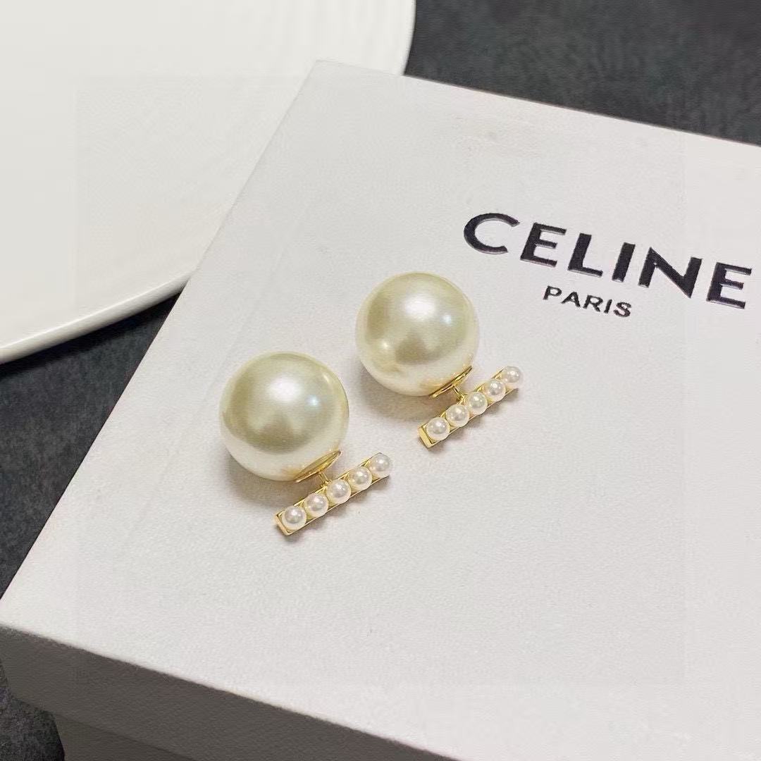 Martin Graham stud earrings in polished metal-tone – main product view