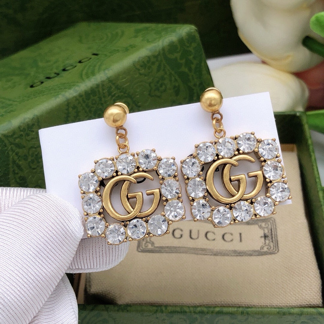 Martin Graham stud earrings in polished metal-tone – main product view