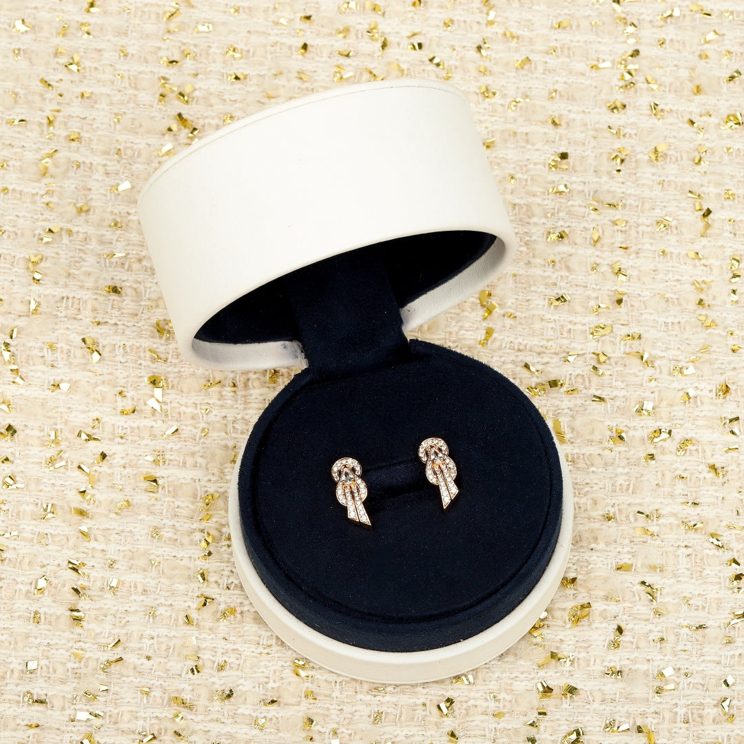 Martin Graham stud earrings in polished metal-tone – main product view