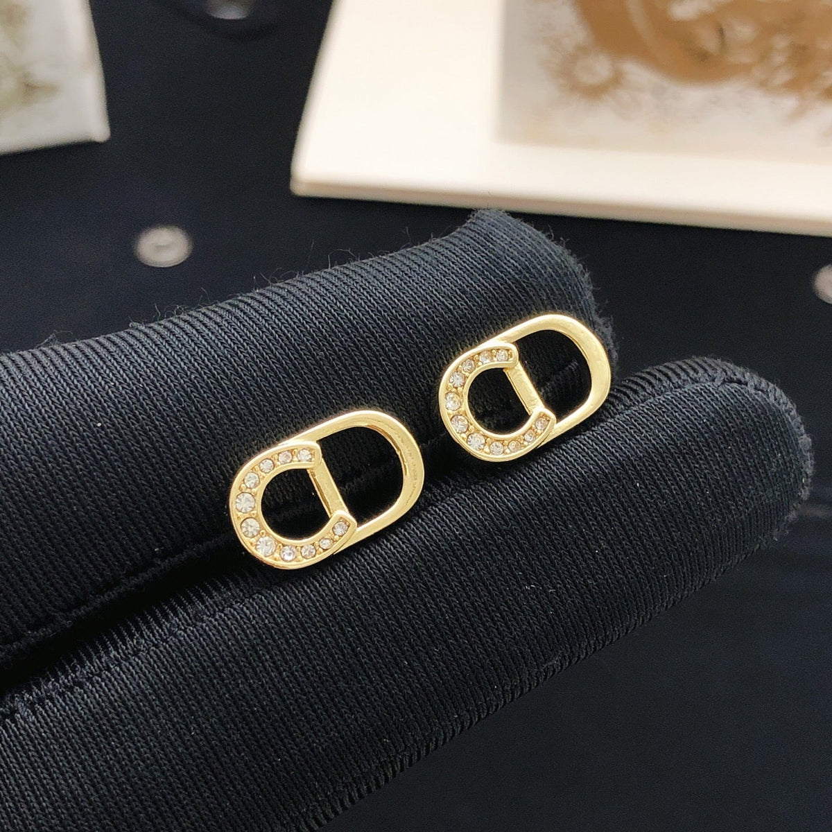 Martin Graham stud earrings in polished metal-tone – main product view