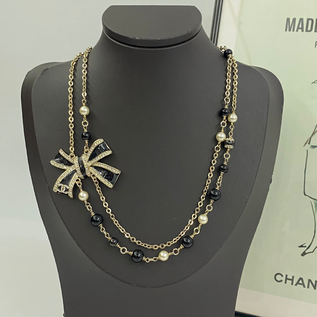 Martin Graham pendant necklace in polished metal-tone – main product view