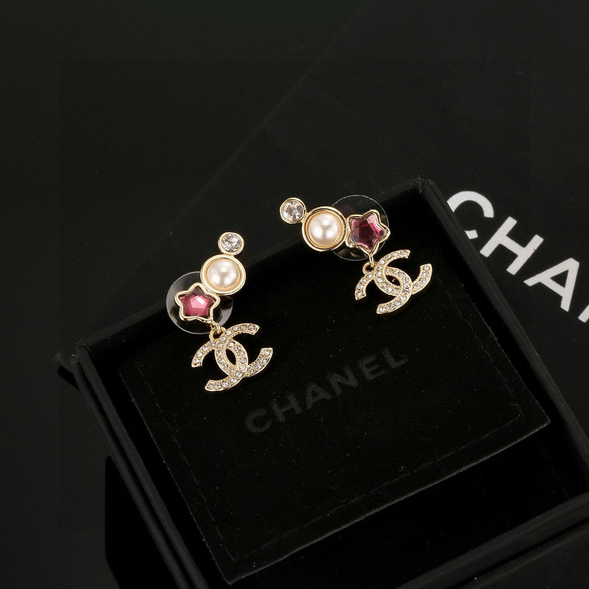 Martin Graham stud earrings in polished metal-tone – main product view