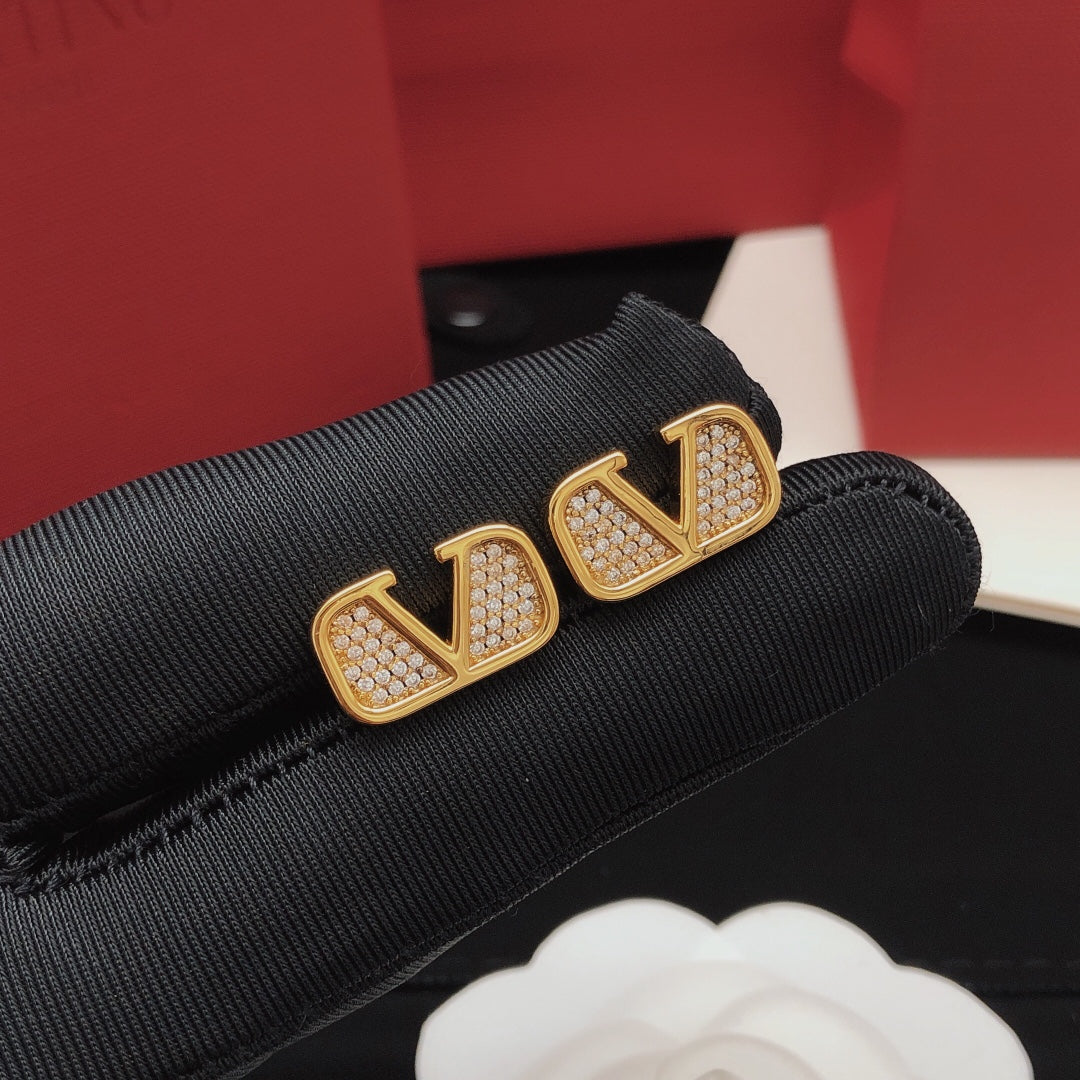 Martin Graham stud earrings in polished metal-tone – main product view