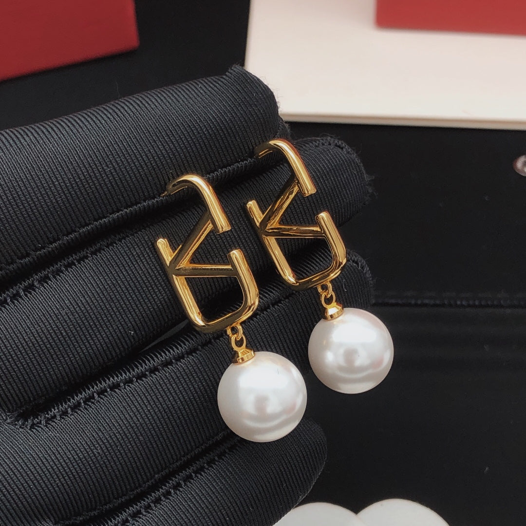 Martin Graham stud earrings in polished metal-tone – main product view