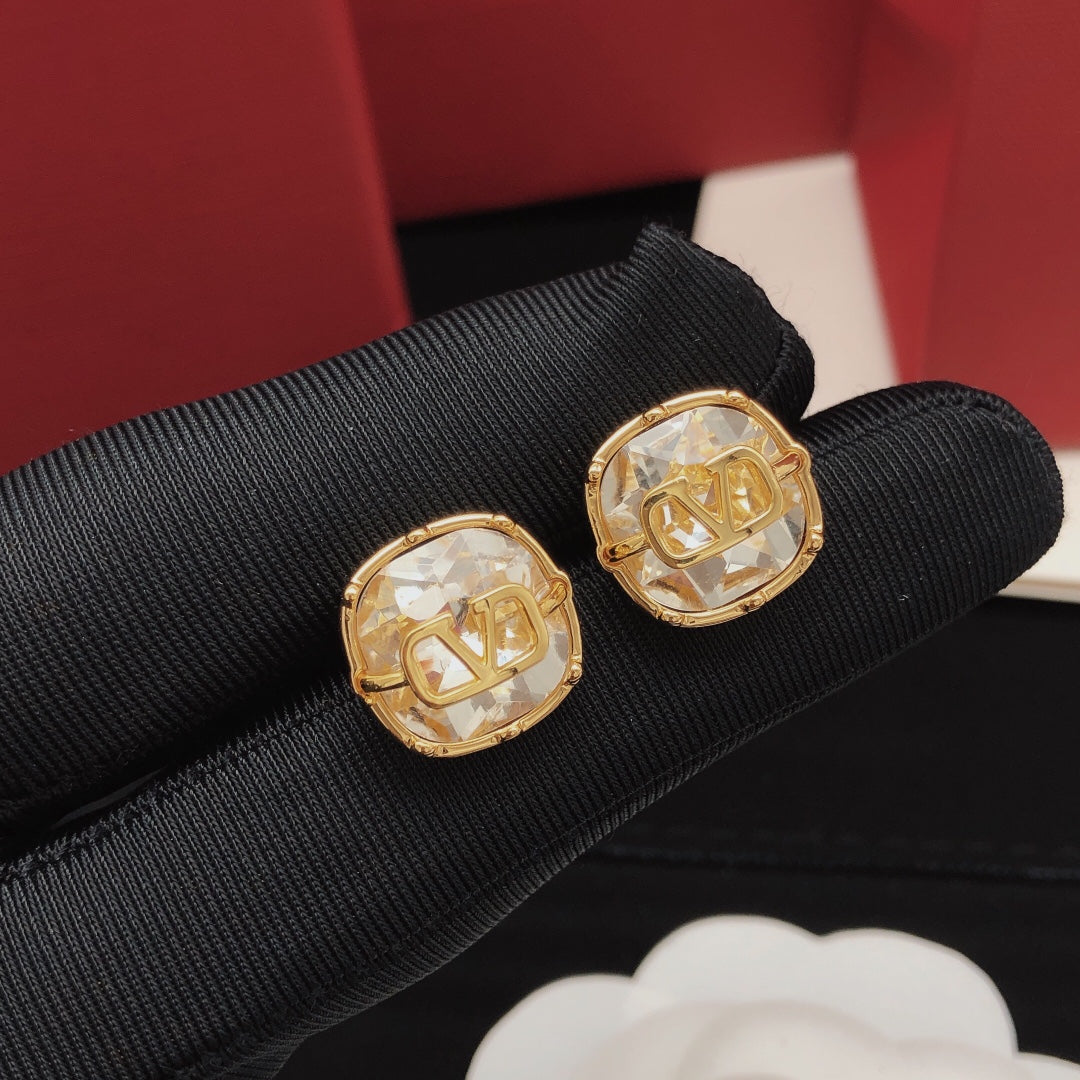 Martin Graham stud earrings in polished metal-tone – main product view