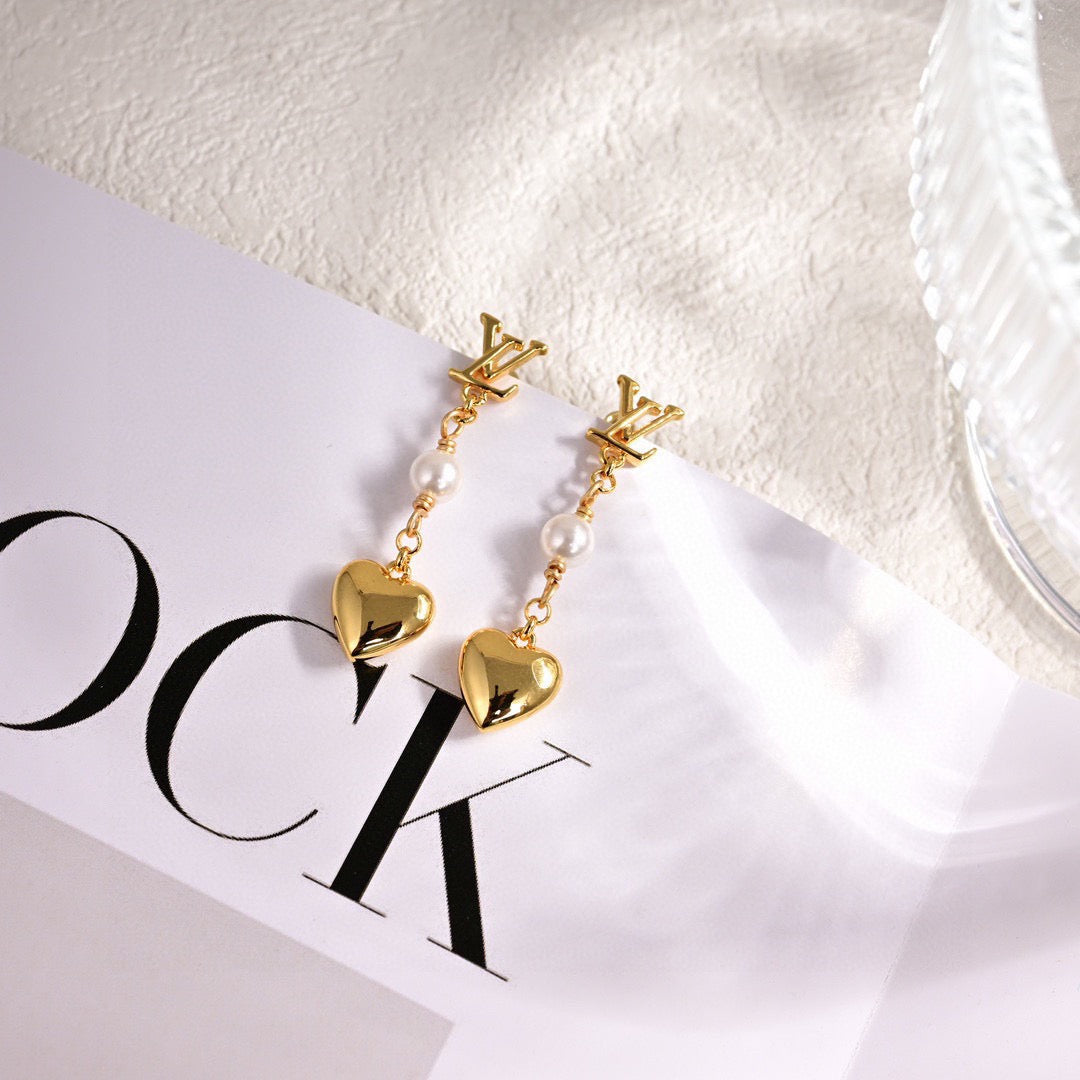 Martin Graham stud earrings in polished metal-tone – main product view