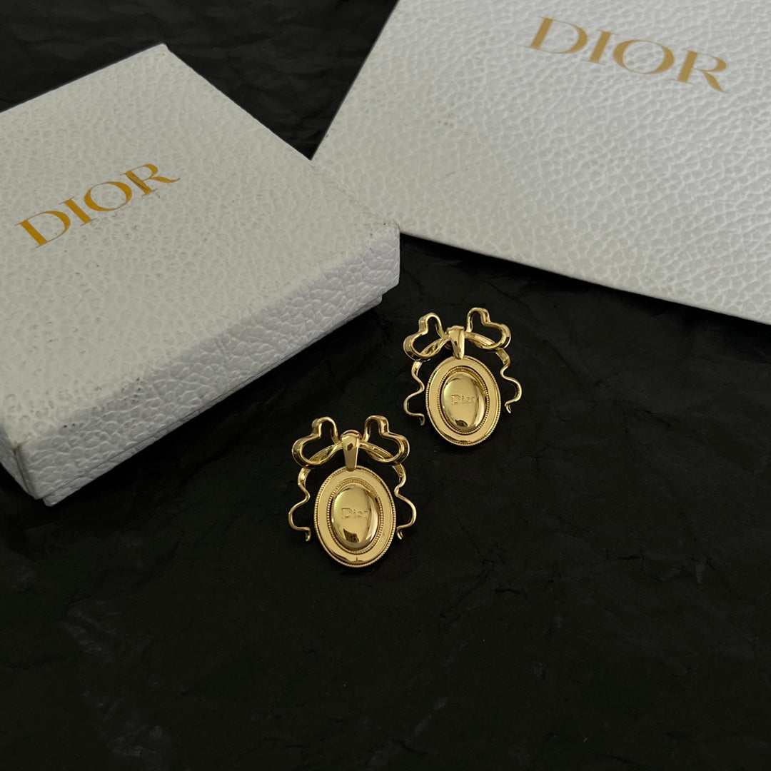 Martin Graham stud earrings in polished metal-tone – main product view
