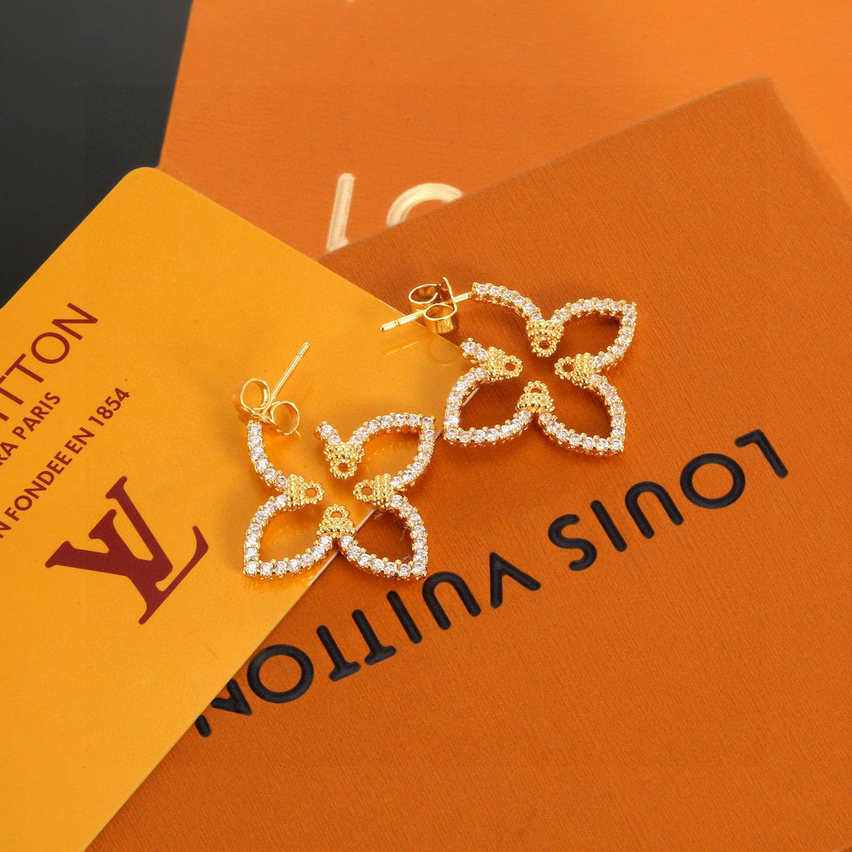 Martin Graham stud earrings in polished metal-tone – main product view