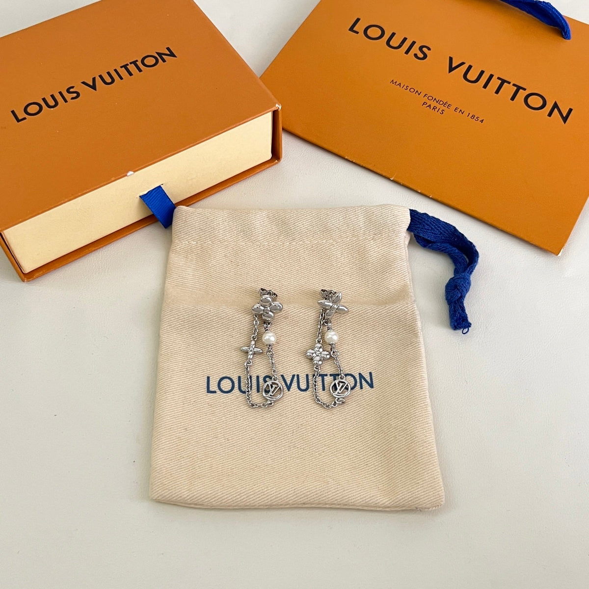 Martin Graham stud earrings in polished metal-tone – main product view