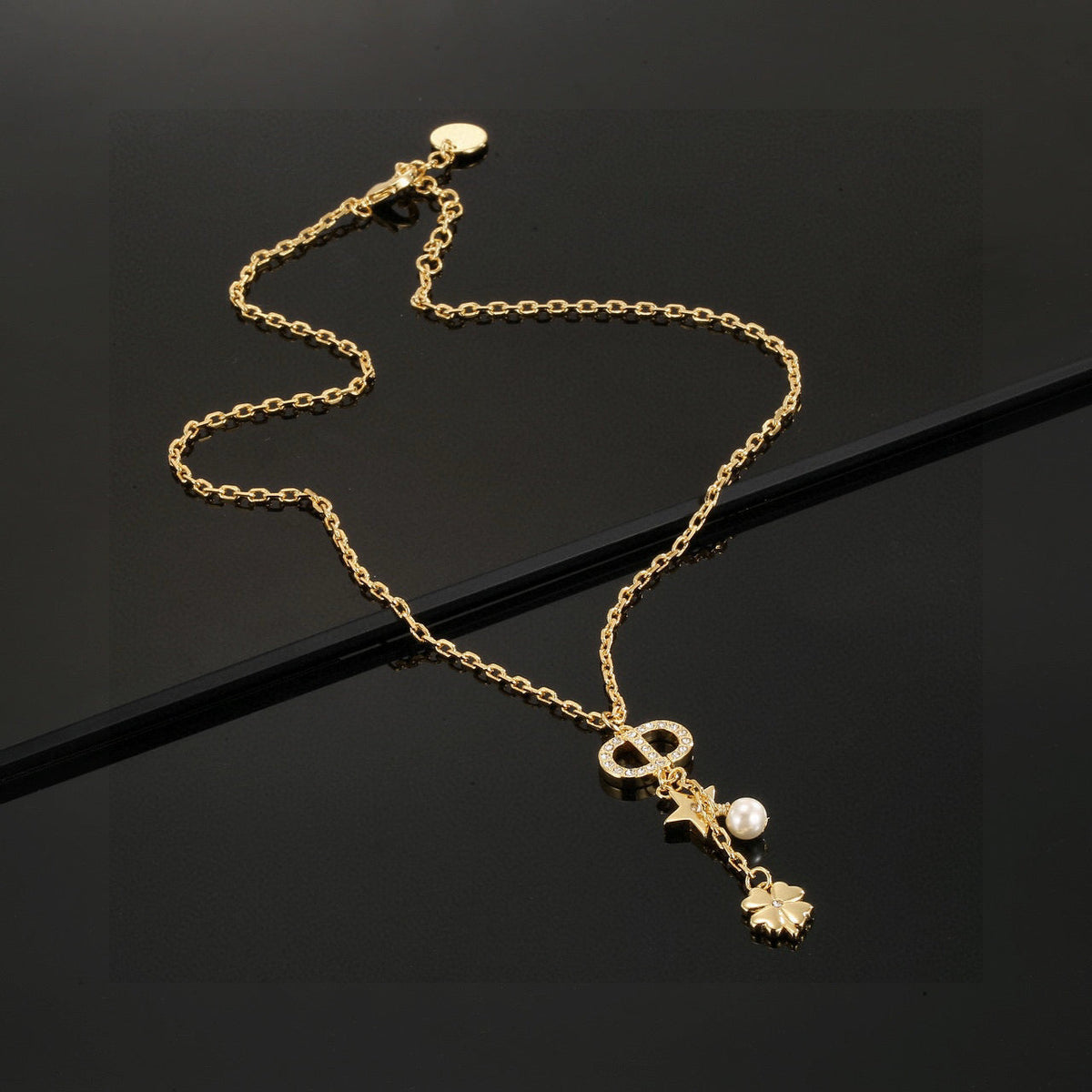 Martin Graham pendant necklace in polished metal-tone – main product view