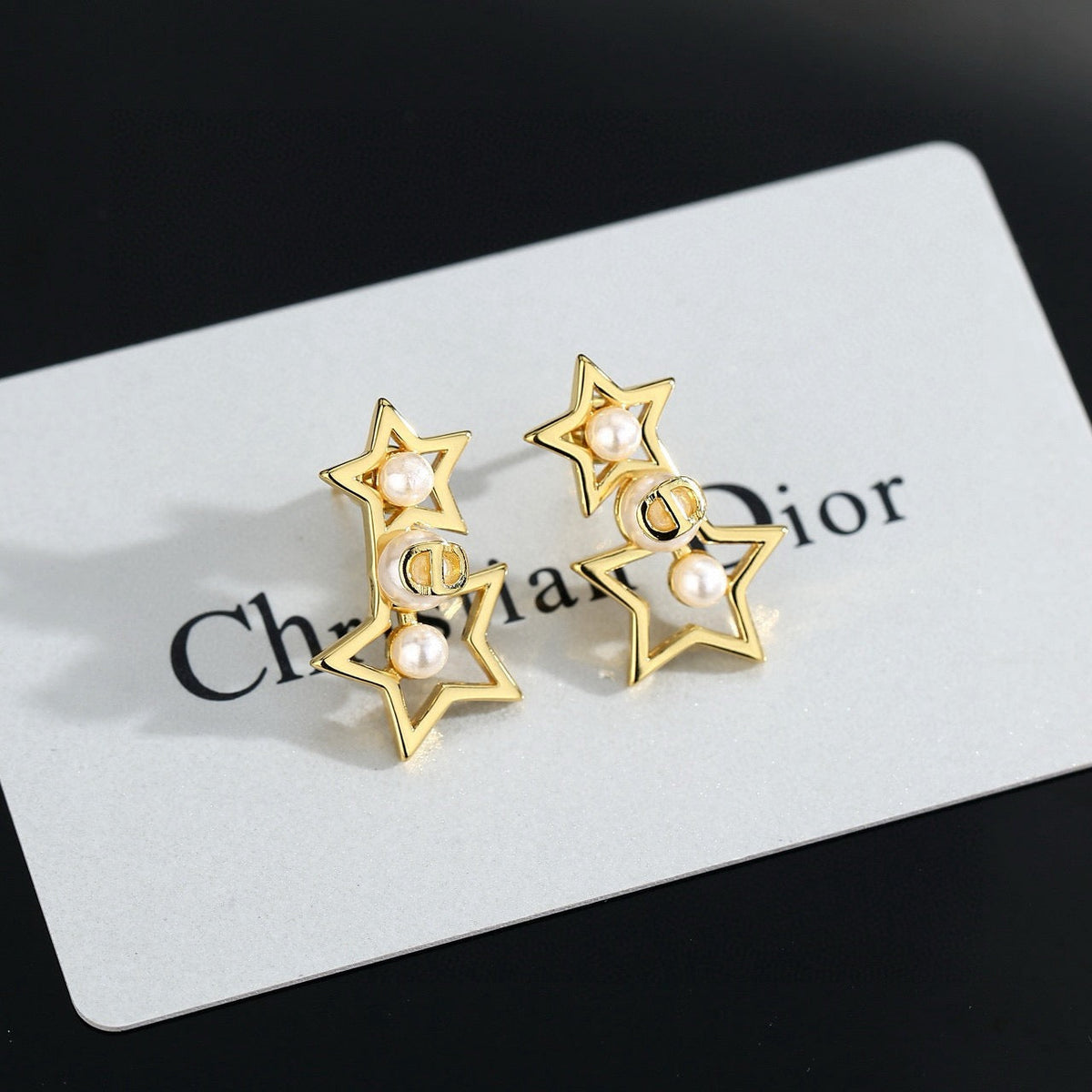 Martin Graham stud earrings in polished metal-tone – main product view