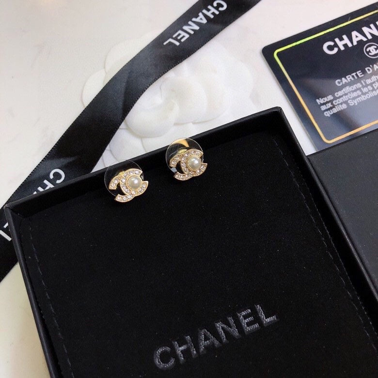 Martin Graham stud earrings in polished metal-tone – main product view