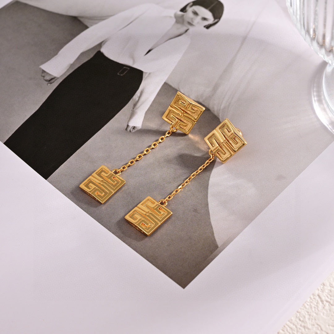 Martin Graham stud earrings in polished metal-tone – main product view