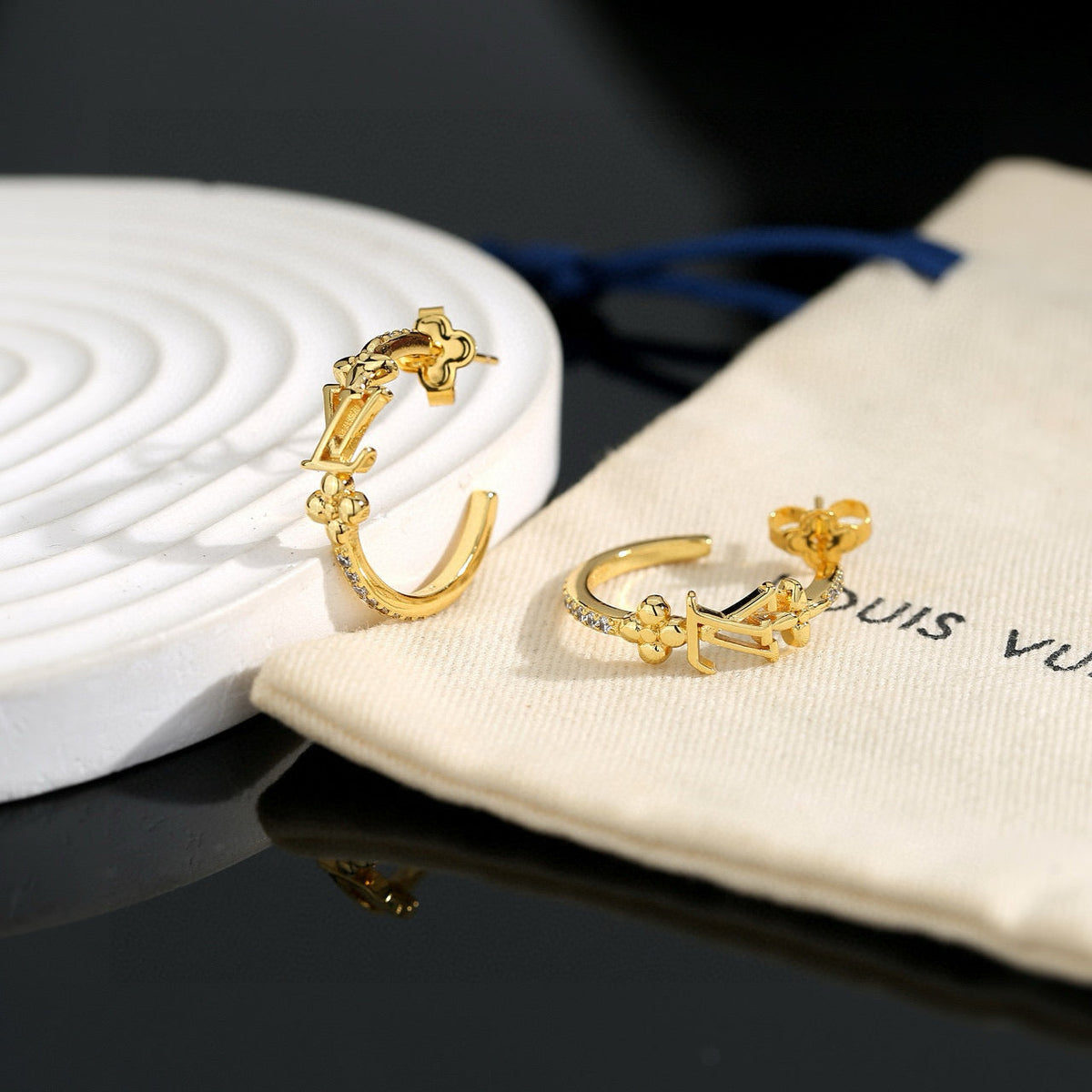 Martin Graham stud earrings in polished metal-tone – main product view