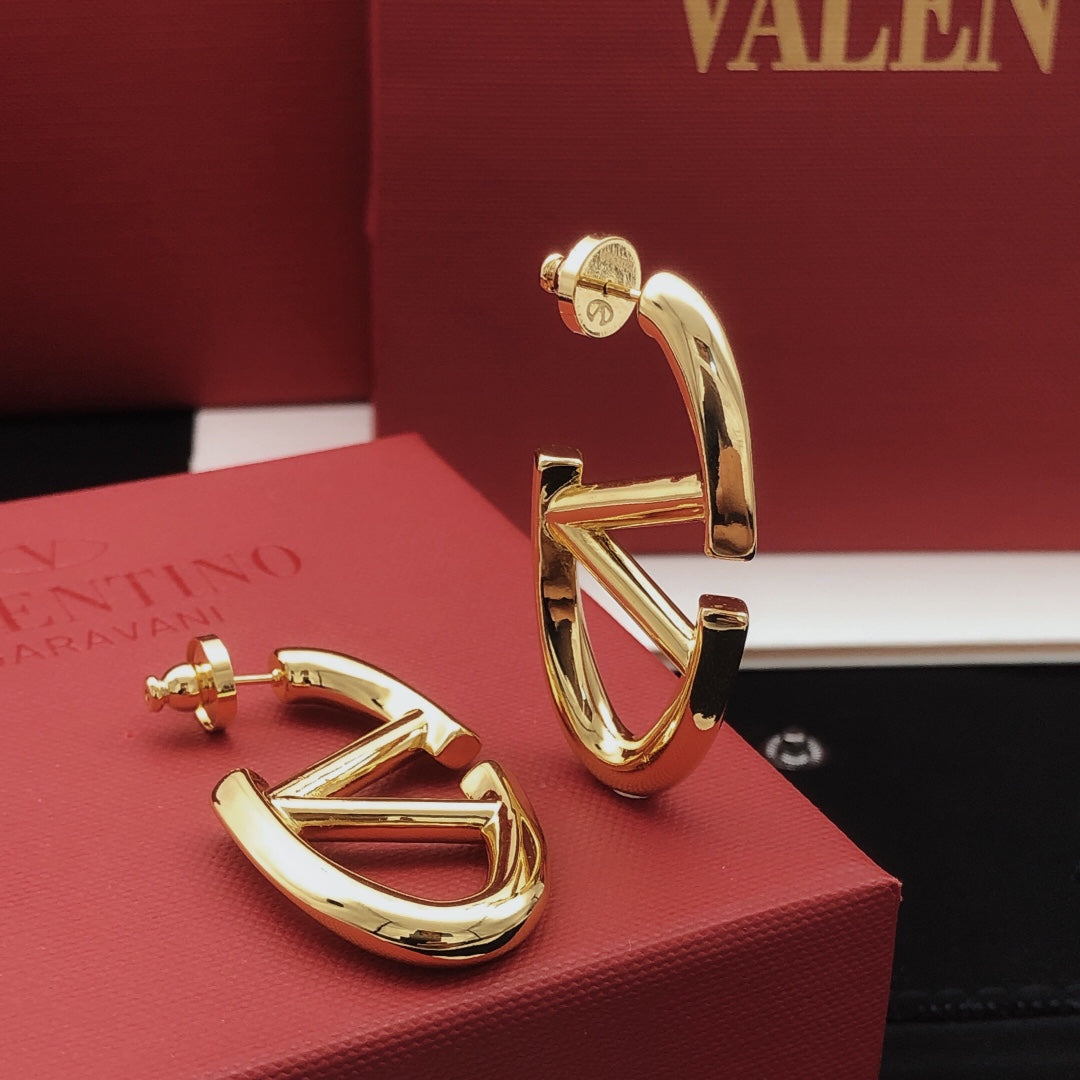 Martin Graham drop earrings in polished metal-tone – main product view
