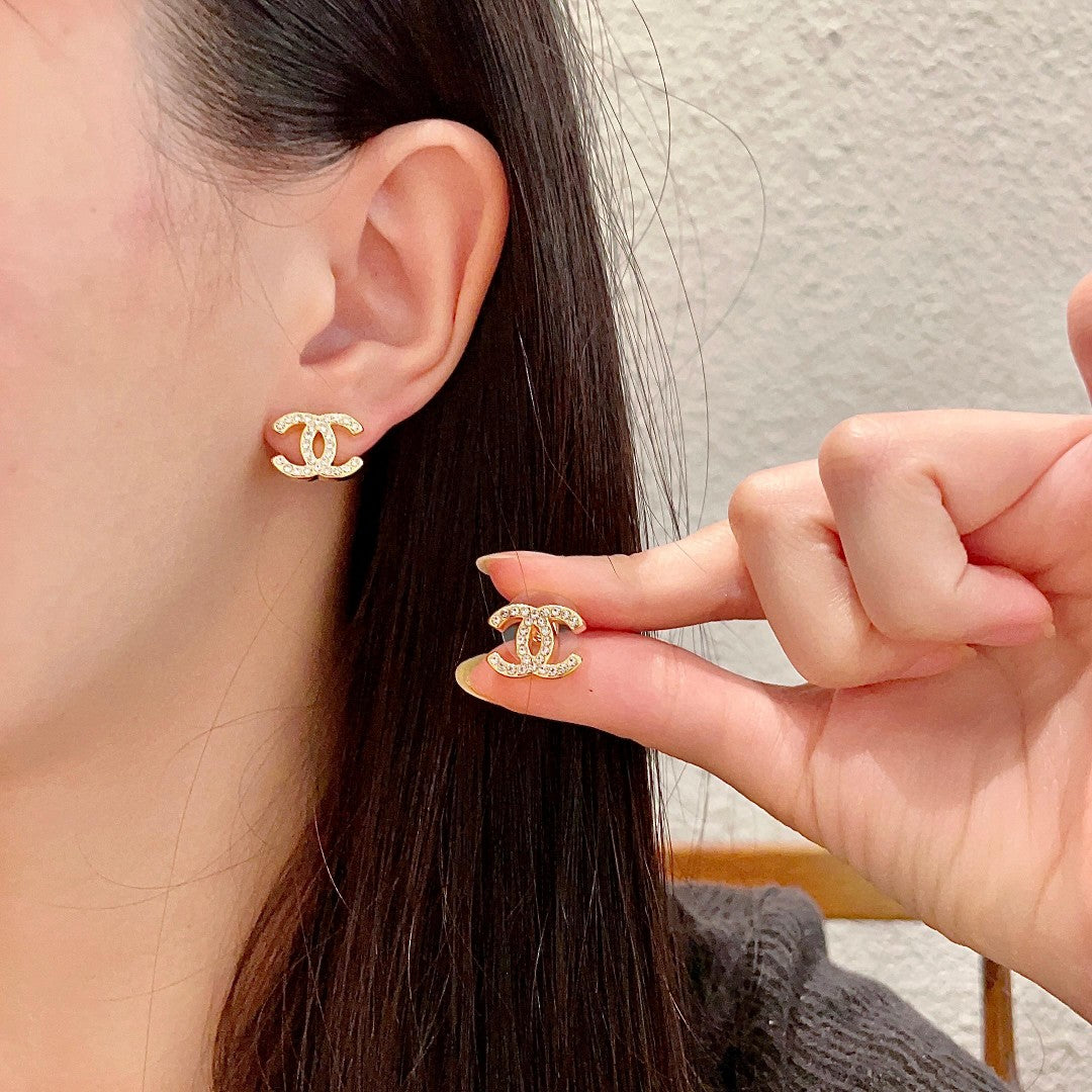 Martin Graham stud earrings in polished metal-tone – main product view