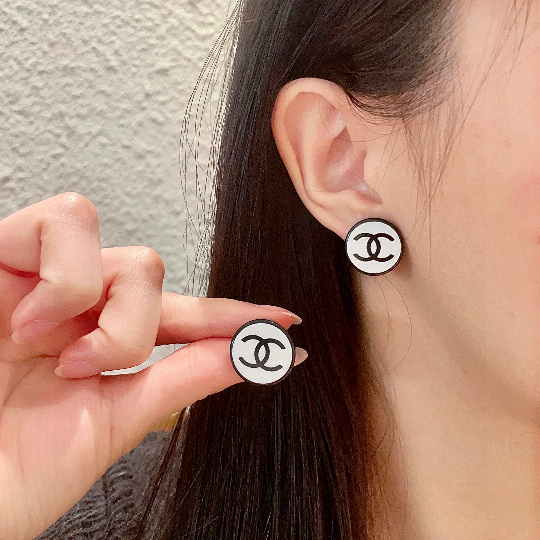 Martin Graham stud earrings in polished metal-tone – main product view