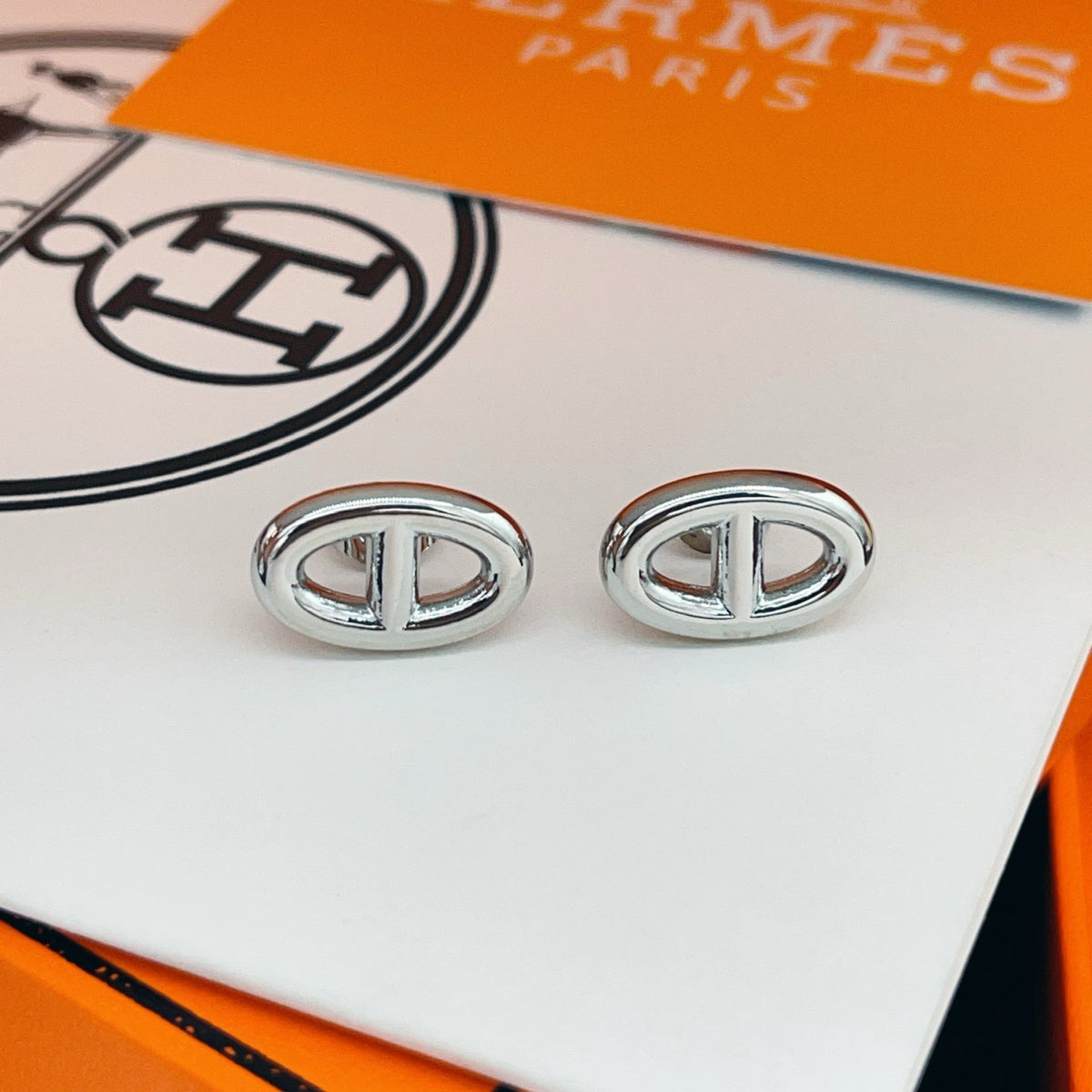 Martin Graham stud earrings in polished metal-tone – main product view