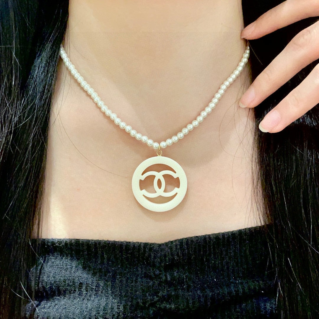 Martin Graham pendant necklace in polished metal-tone – main product view