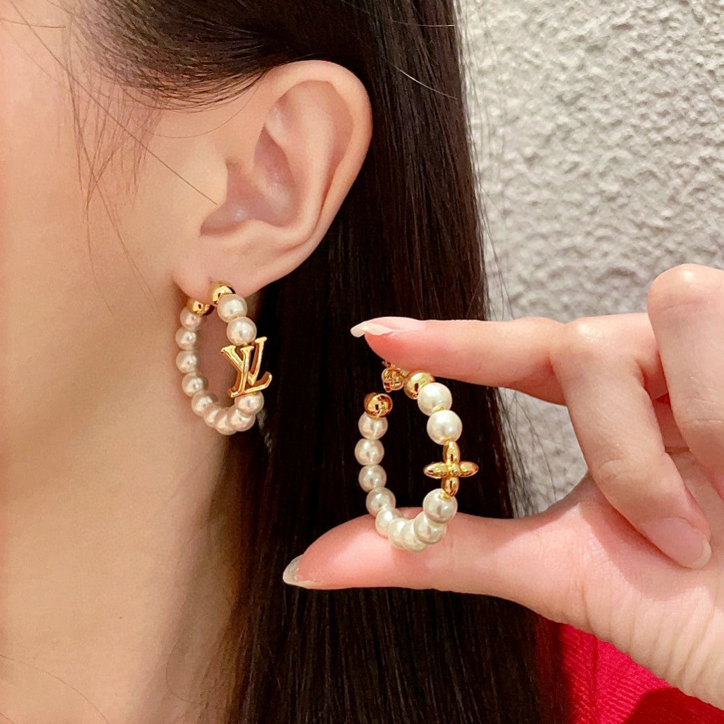 Martin Graham stud earrings in polished metal-tone – main product view