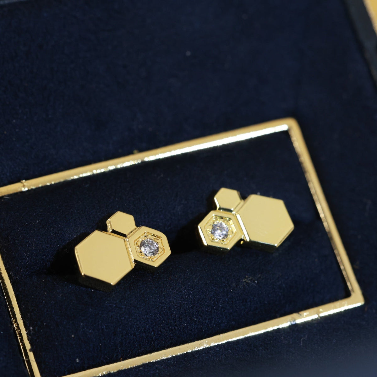 Martin Graham stud earrings in polished metal-tone – main product view