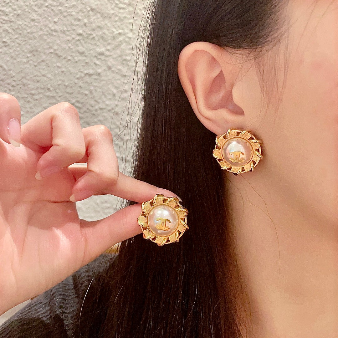 Martin Graham stud earrings in polished metal-tone – main product view