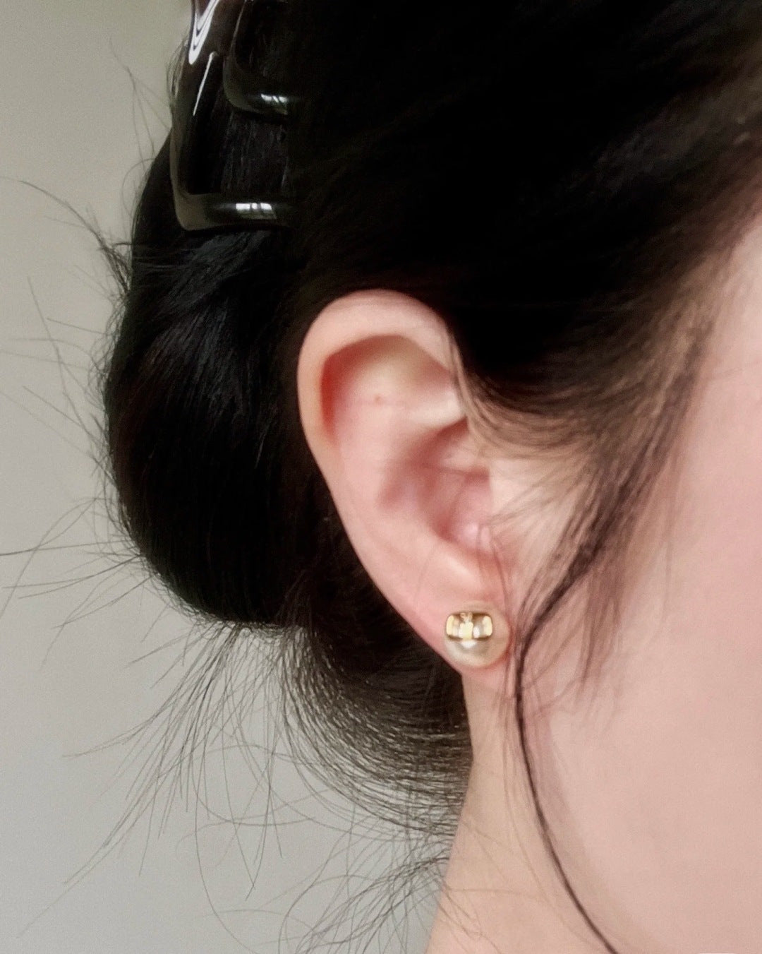 Martin Graham stud earrings in polished metal-tone – main product view