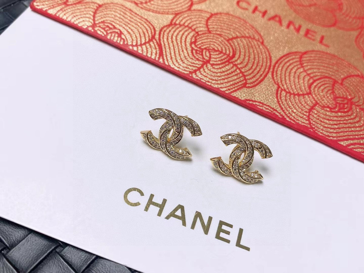 Martin Graham stud earrings in polished metal-tone – main product view