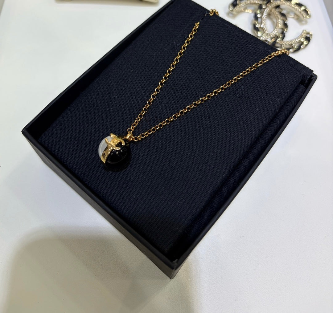Martin Graham pendant necklace in polished metal-tone – main product view