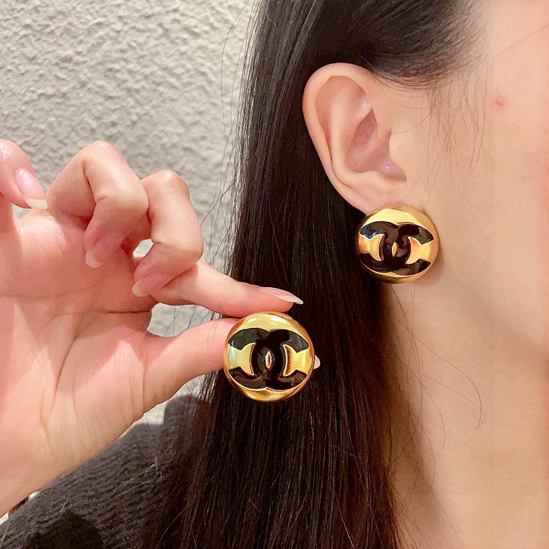 Martin Graham stud earrings in polished metal-tone – main product view