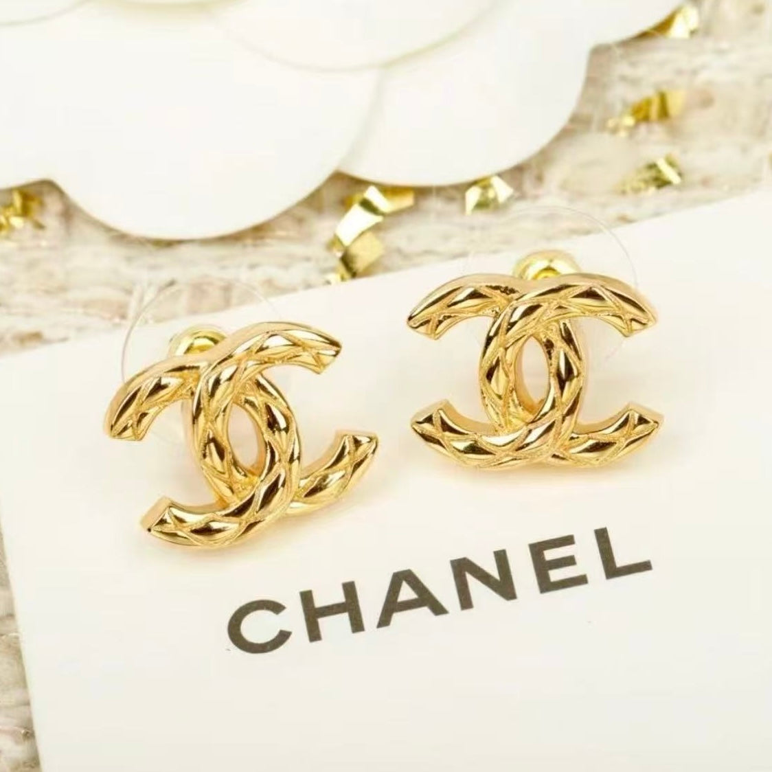 Martin Graham stud earrings in polished metal-tone – main product view