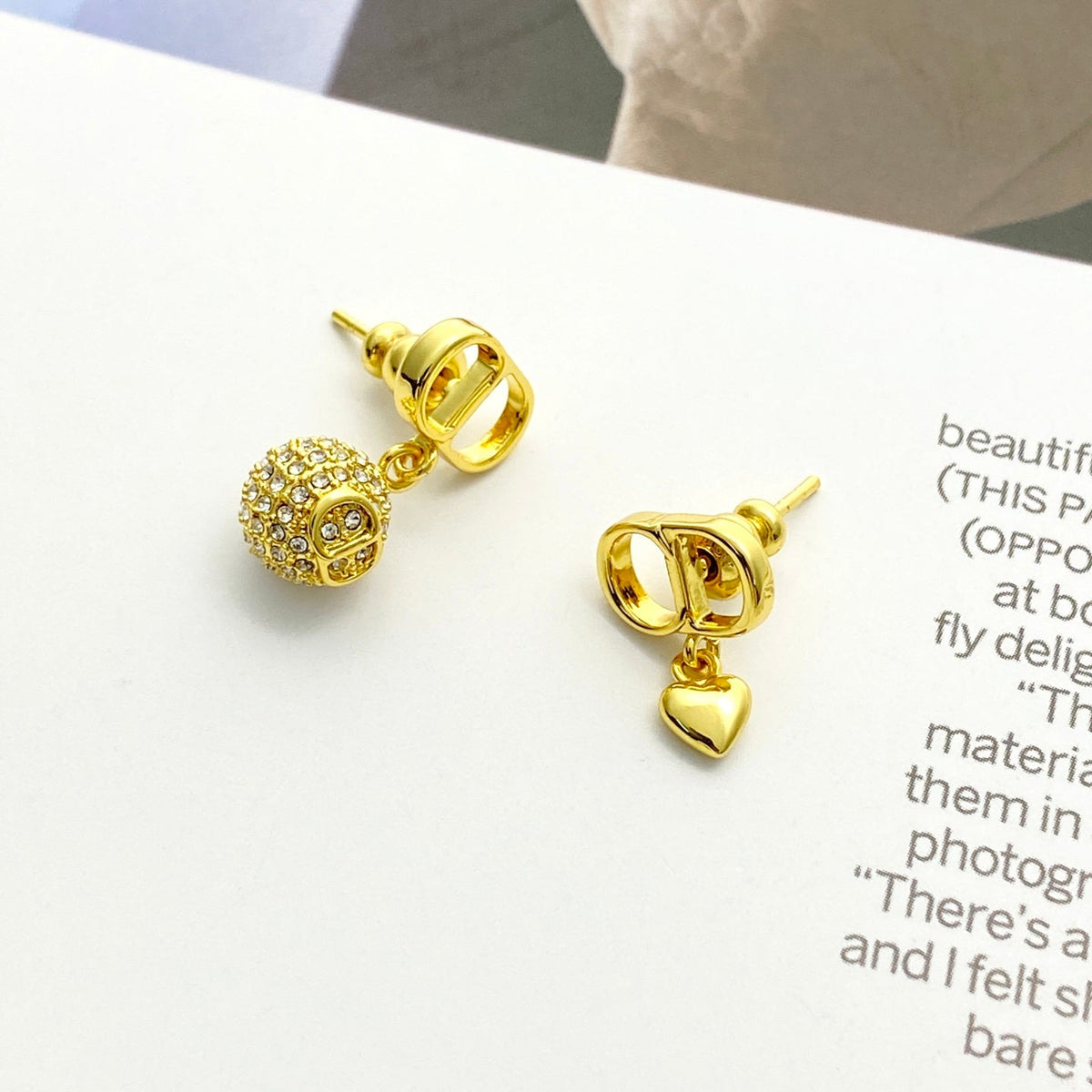Martin Graham stud earrings in polished metal-tone – main product view