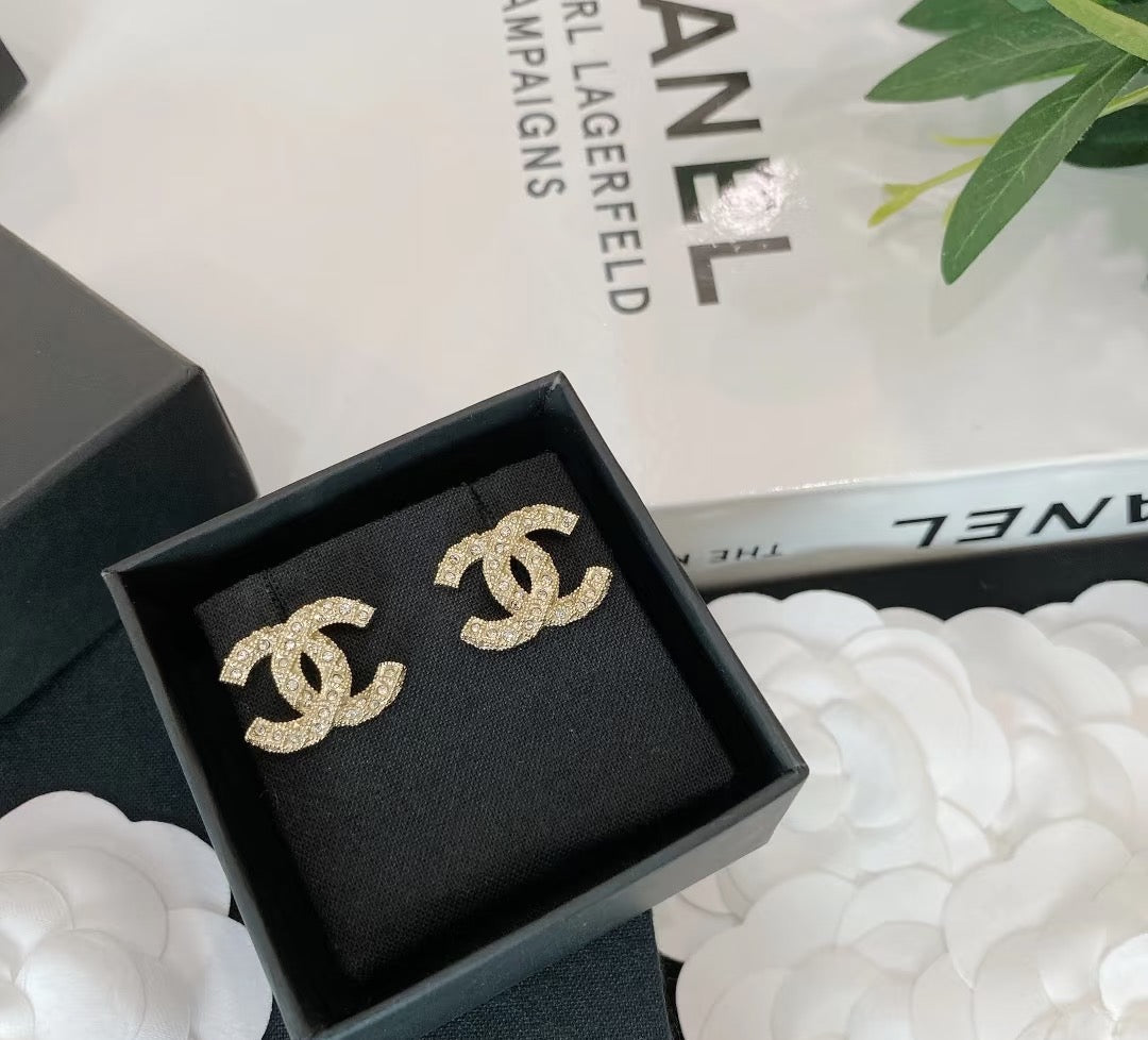 Martin Graham stud earrings in polished metal-tone – main product view