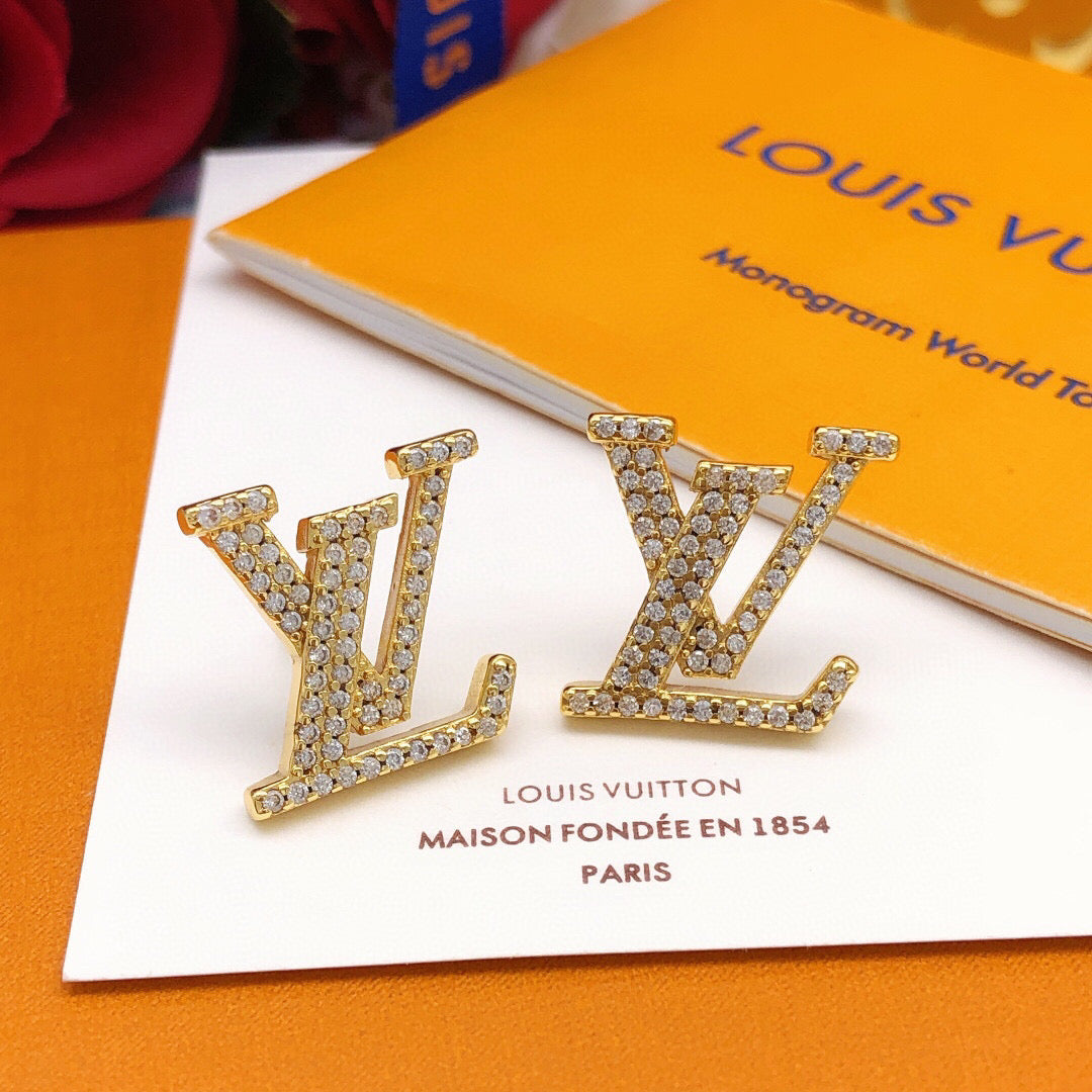Martin Graham stud earrings in polished metal-tone – main product view