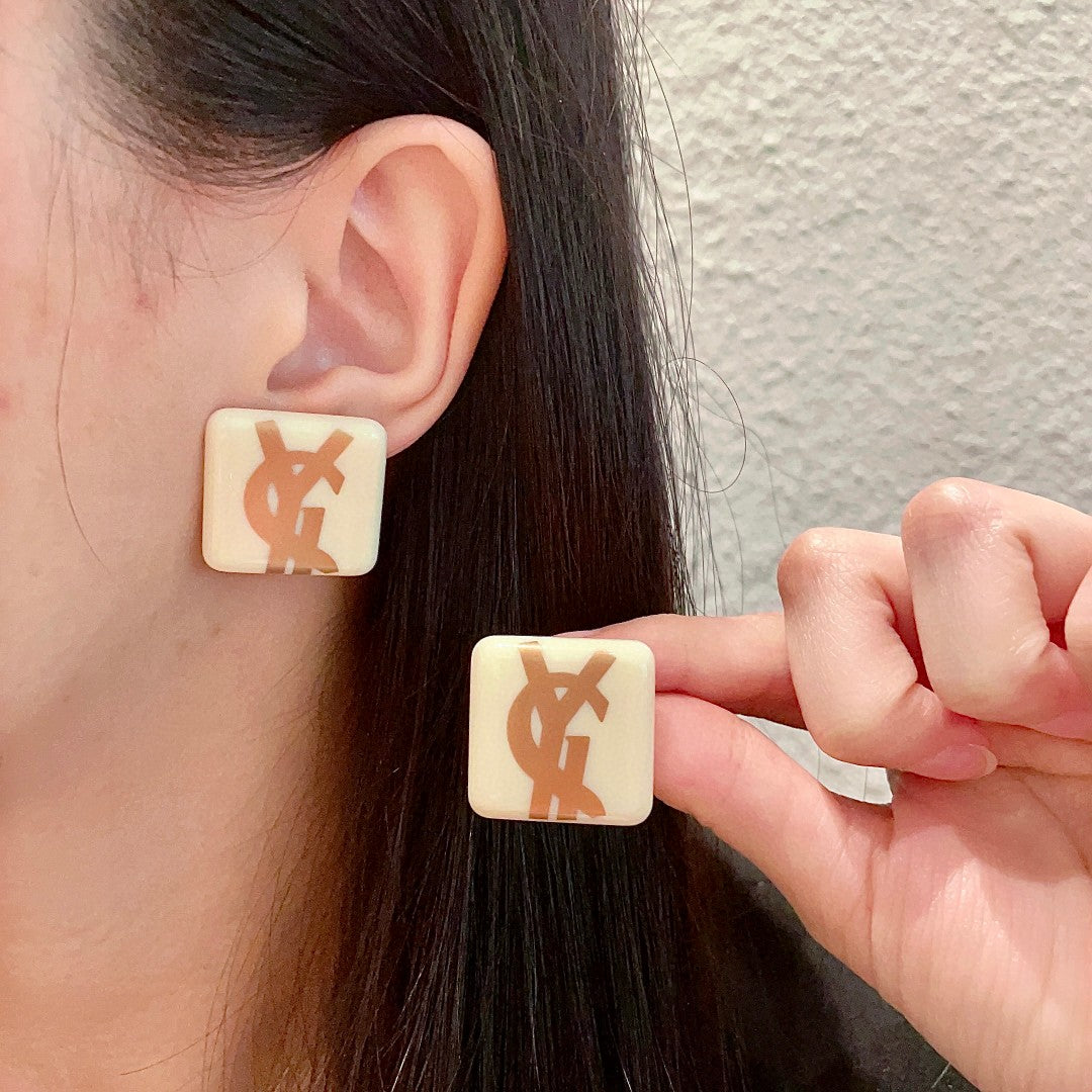Martin Graham stud earrings in polished metal-tone – main product view